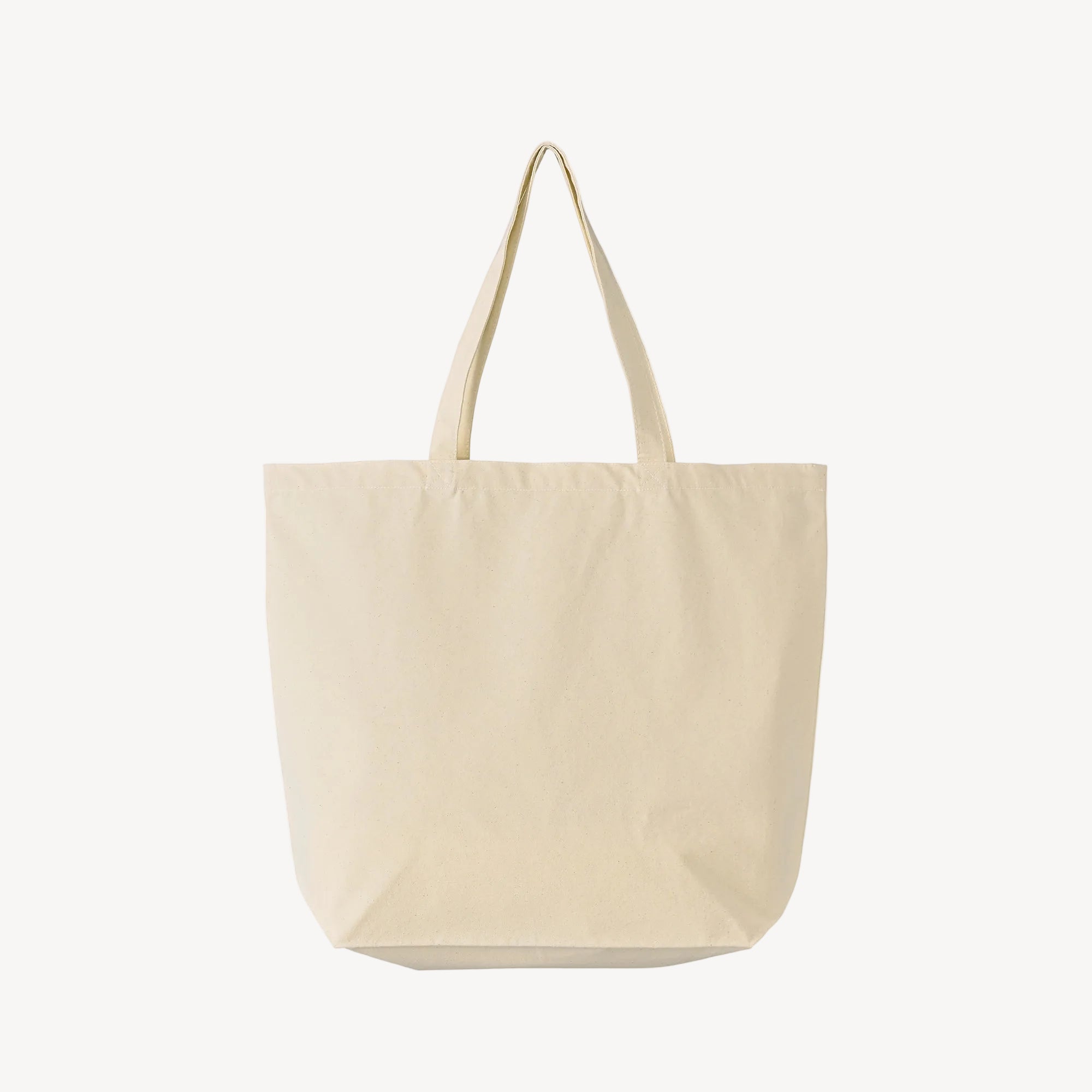 Collis Felixのナチュラルカラーのトートバッグを背面から撮影した商品画像。ロゴやプリントのないシンプルなデザイン。